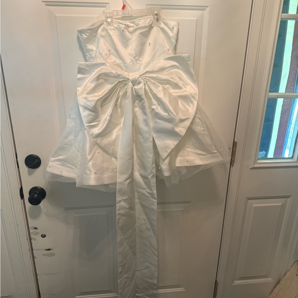 Elegant White Dress with Large Bow